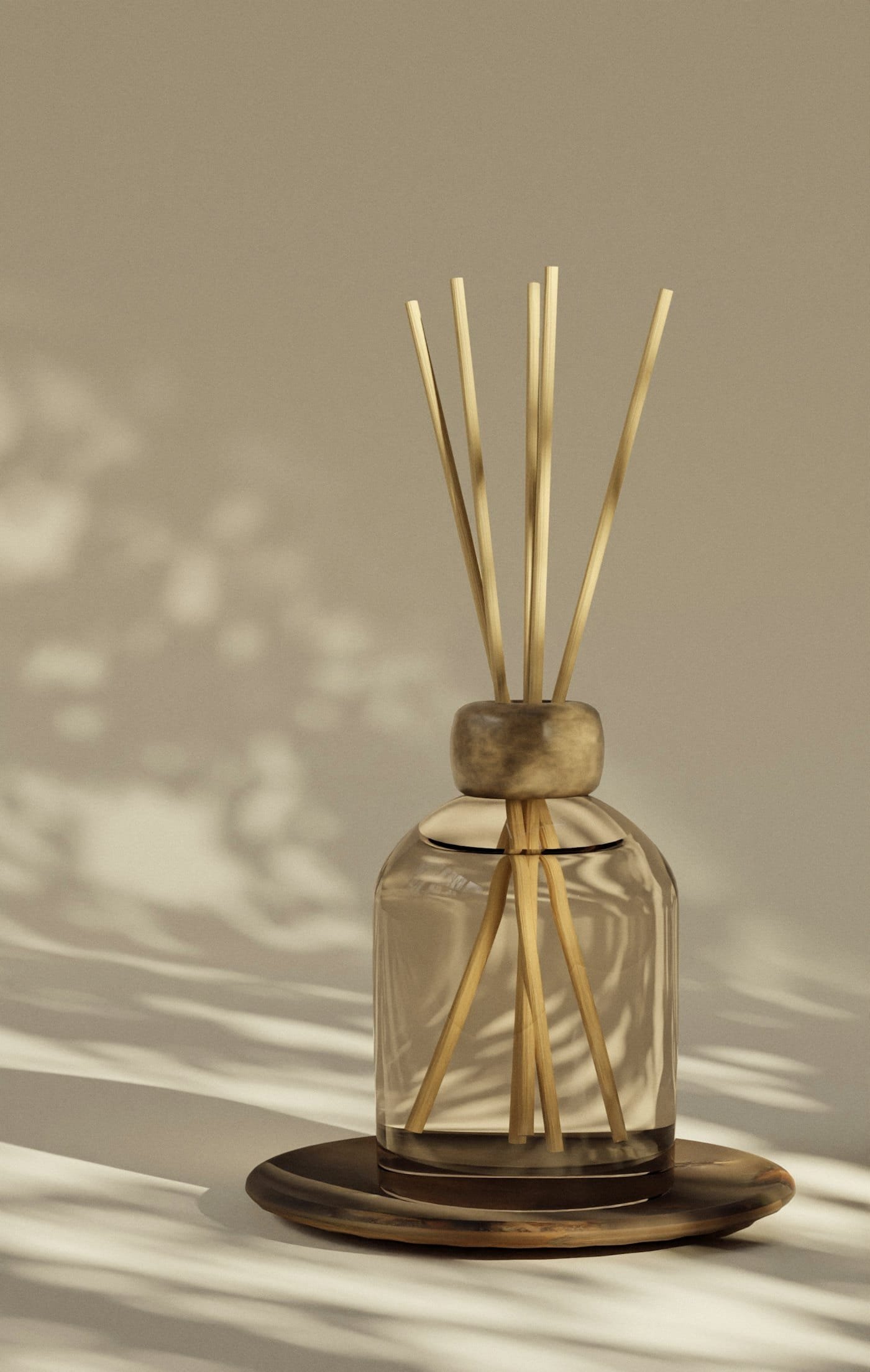 A glass reed diffuser on a ceramic plate