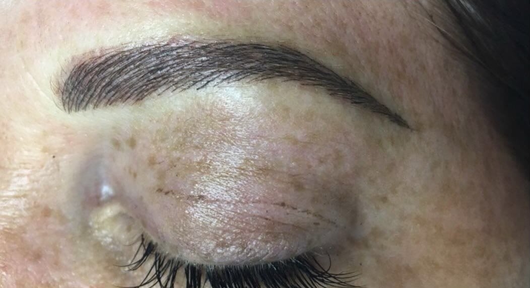 A fine, faint brow before microblading, and a fuller, arched brow with hair-like strokes after